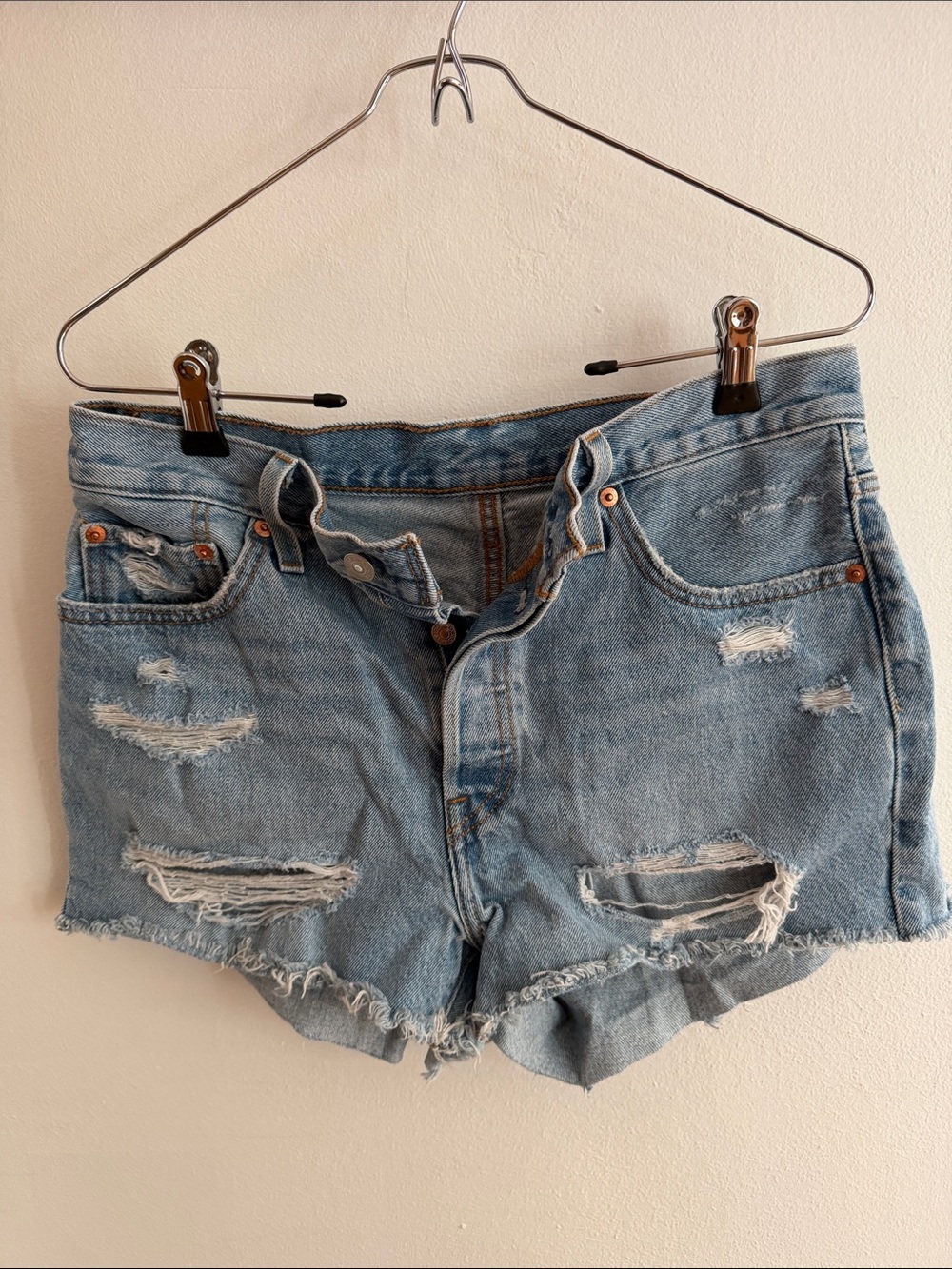 High-Rise Light Blue Levi’s 501 Distressed Denim Cutoff Shorts